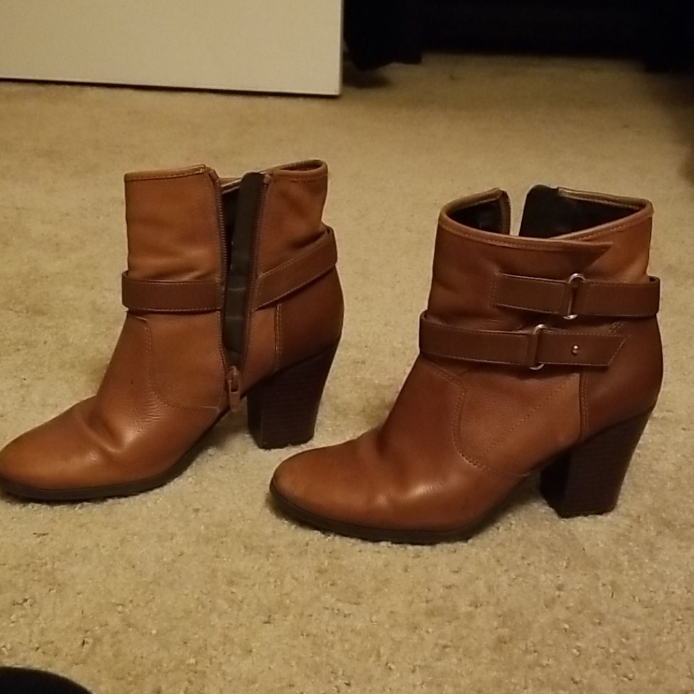 #24) Brown zip up booties with buckle design